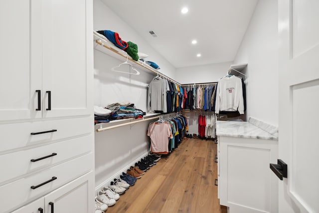 walk in closet featuring light wood-type flooring