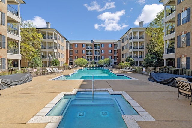 view of pool featuring a patio area