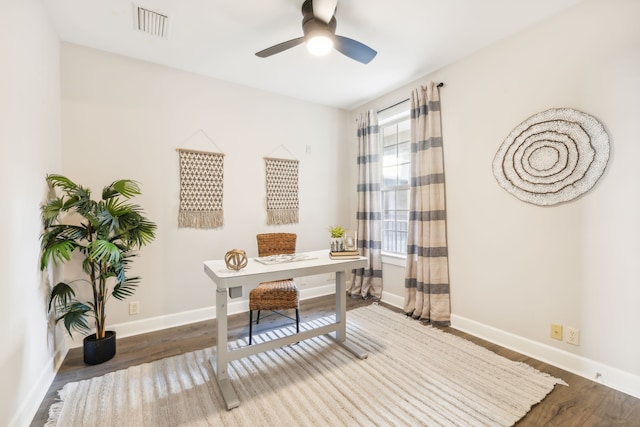 home office featuring ceiling fan and wood-type flooring