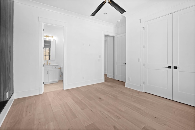 5104 Cobbler Ridge Ct, Franklin, TN 37064 - unfurnished bedroom with baseboards, light wood-style floors, a closet, and ornamental molding