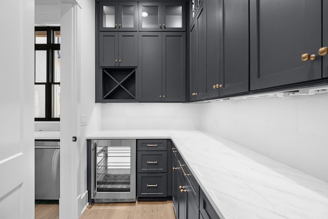 5104 Cobbler Ridge Ct, Franklin, TN 37064 - bar with wine cooler and light wood-type flooring