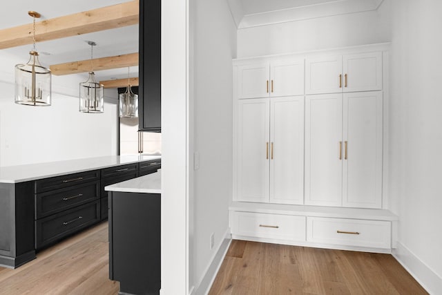 5104 Cobbler Ridge Ct, Franklin, TN 37064 - mudroom featuring light wood-type flooring, beamed ceiling, and baseboards