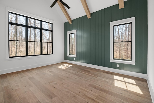 5104 Cobbler Ridge Ct, Franklin, TN 37064 - empty room featuring light wood-style floors, a healthy amount of sunlight, and beam ceiling