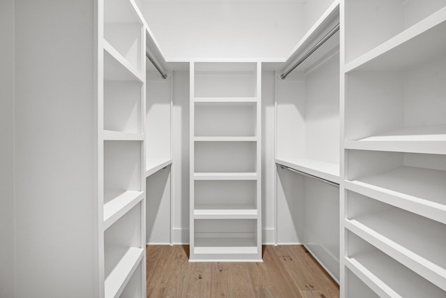 5104 Cobbler Ridge Ct, Franklin, TN 37064 - walk in closet featuring wood finished floors