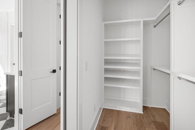 5104 Cobbler Ridge Ct, Franklin, TN 37064 - walk in closet with light wood-style flooring