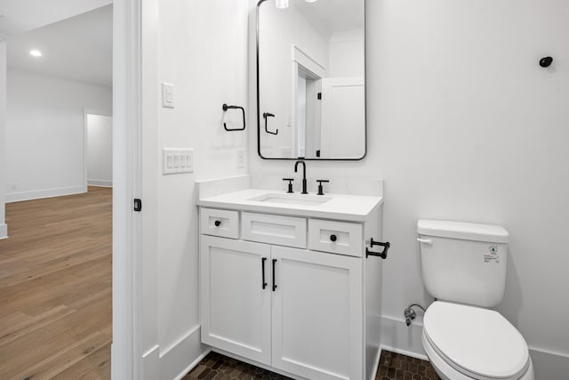 5104 Cobbler Ridge Ct, Franklin, TN 37064 - bathroom featuring toilet, wood finished floors, vanity, and baseboards