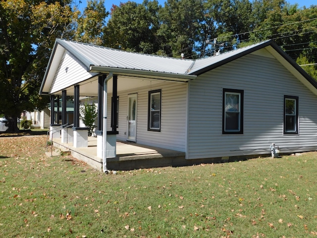 exterior space featuring a front lawn