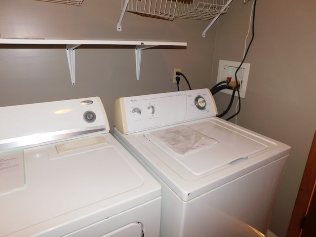 laundry room with separate washer and dryer