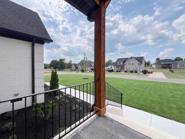 view of patio / terrace with a balcony