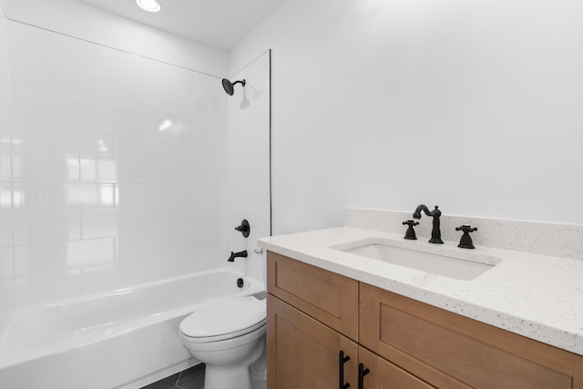 full bathroom with toilet, tiled shower / bath, vanity, and tile patterned flooring