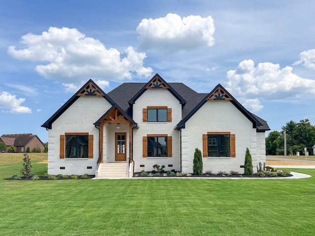 view of front of home with a front yard