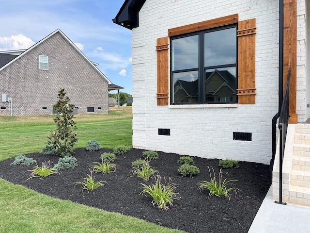 view of home's exterior featuring a lawn