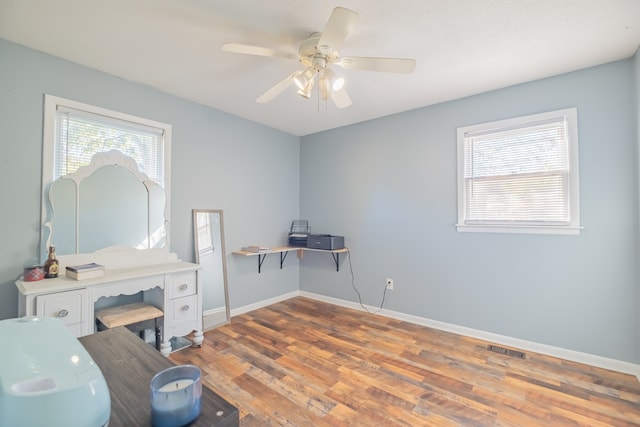 interior space featuring light wood-type flooring and ceiling fan