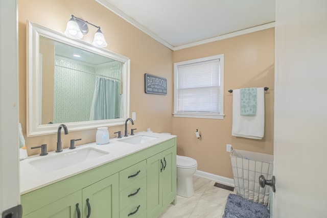 bathroom with vanity, toilet, crown molding, and a shower with shower curtain