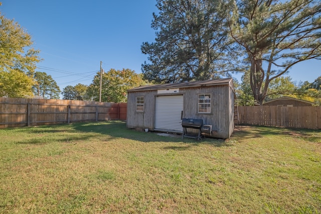 view of outdoor structure featuring a yard