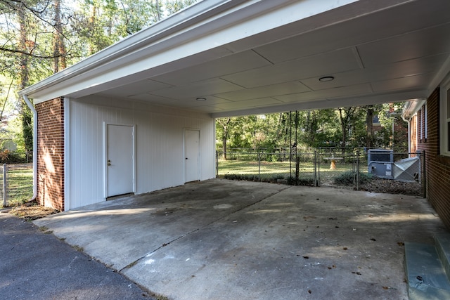 view of parking / parking lot with a carport