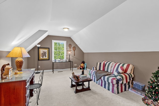 living room with light carpet and vaulted ceiling