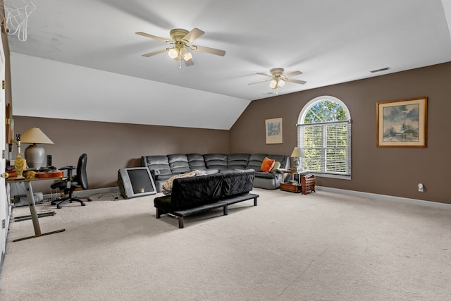 living room with carpet floors, ceiling fan, and vaulted ceiling