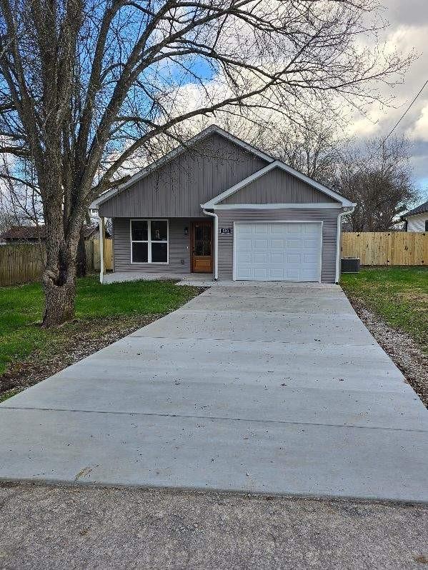 view of front of property featuring a garage