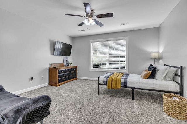 bedroom with ceiling fan and carpet flooring