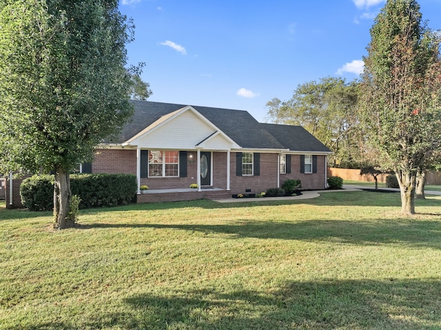 ranch-style home with a front yard