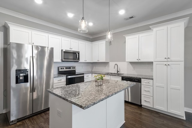 kitchen with white cabinetry, stainless steel appliances, and sink