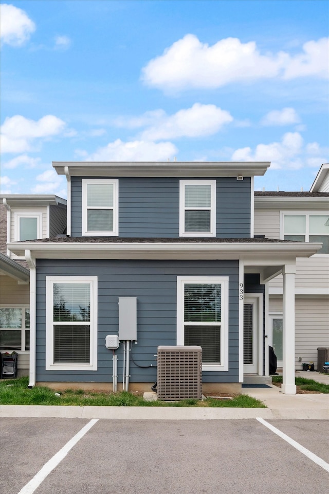 view of front of property featuring cooling unit