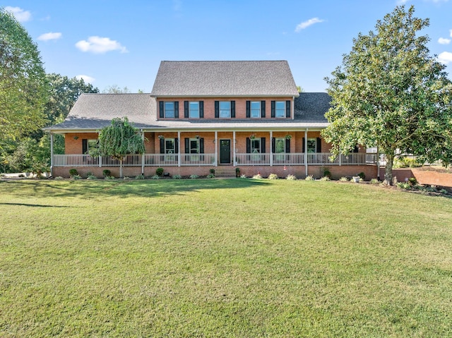 2264 Lock B Rd N, Clarksville, TN 37043 - view of front of house with brick siding, a front yard, and a porch