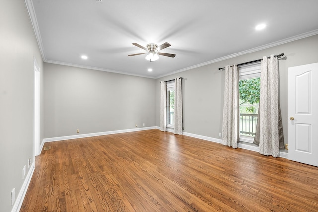 2264 Lock B Rd N, Clarksville, TN 37043 - empty room featuring ceiling fan, plenty of natural light, wood finished floors, ornamental molding, and recessed lighting