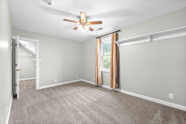 2264 Lock B Rd N, Clarksville, TN 37043 - unfurnished bedroom featuring carpet flooring, a spacious closet, a ceiling fan, and a closet