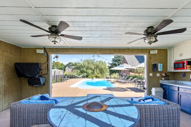 view of patio with ceiling fan