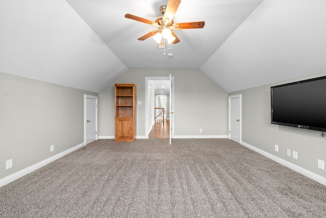 bonus room with ceiling fan, vaulted ceiling, and carpet floors