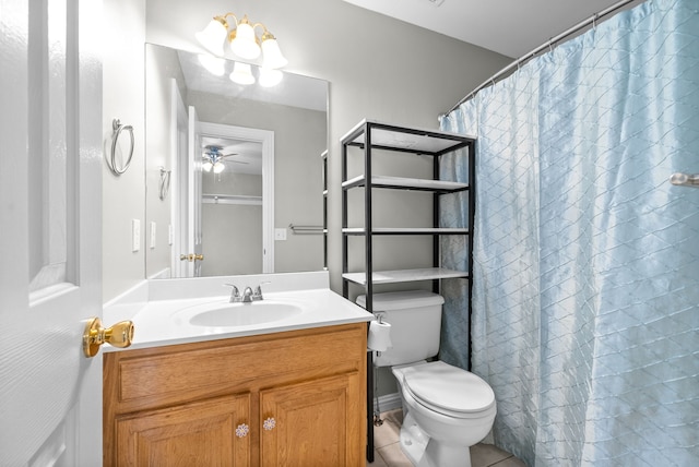 bathroom with ceiling fan, toilet, vanity, curtained shower, and tile patterned floors