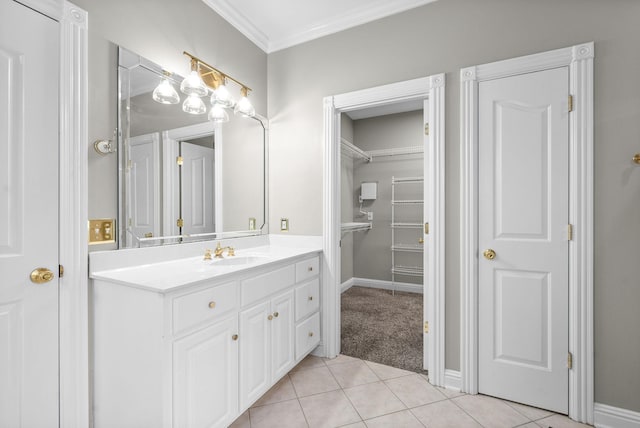 2264 Lock B Rd N, Clarksville, TN 37043 - bathroom featuring vanity, tile patterned floors, crown molding, and a spacious closet