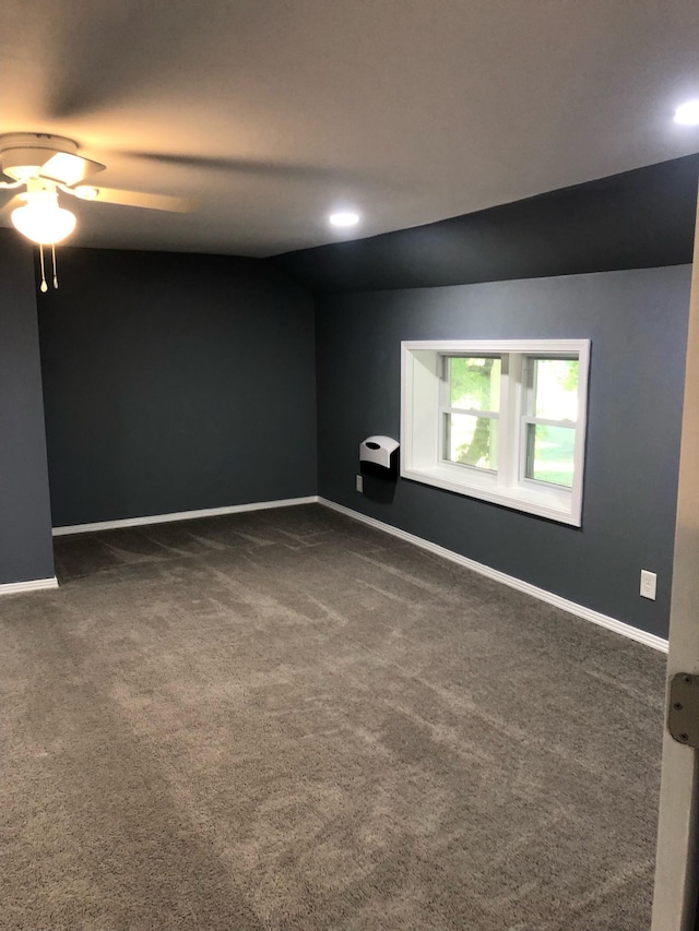 empty room featuring baseboards, carpet, and ceiling fan