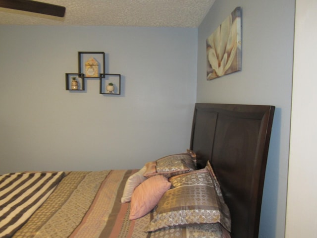bedroom featuring a textured ceiling