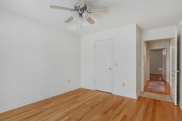 unfurnished bedroom featuring light hardwood / wood-style floors and ceiling fan