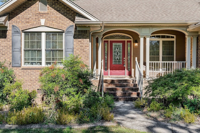 entrance to property with a porch