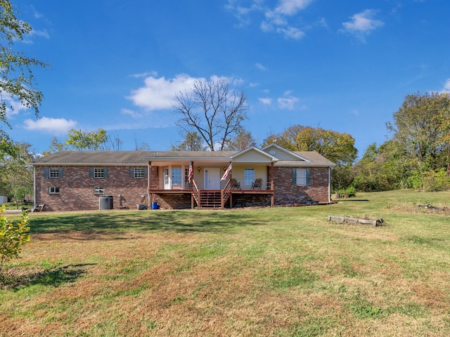 back of house featuring a yard