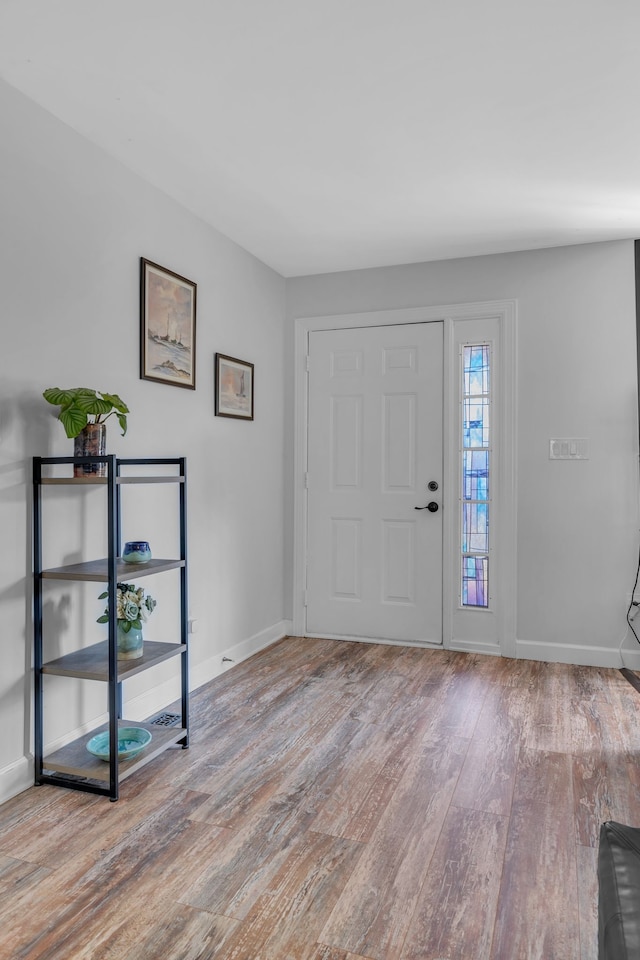 foyer with light hardwood / wood-style floors