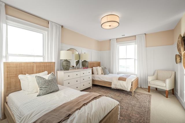 bedroom featuring dark colored carpet