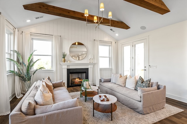 living room with vaulted ceiling with beams and dark hardwood / wood-style floors