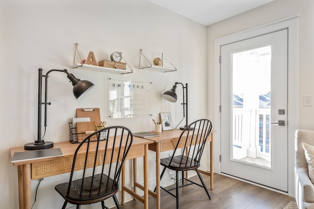 dining area with hardwood / wood-style flooring