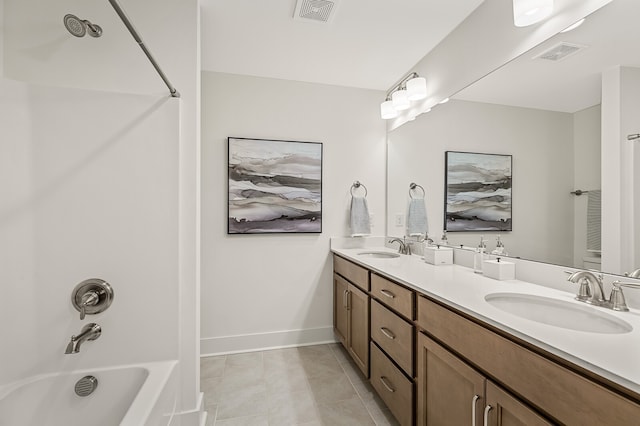 bathroom featuring vanity, shower / washtub combination, and tile patterned floors