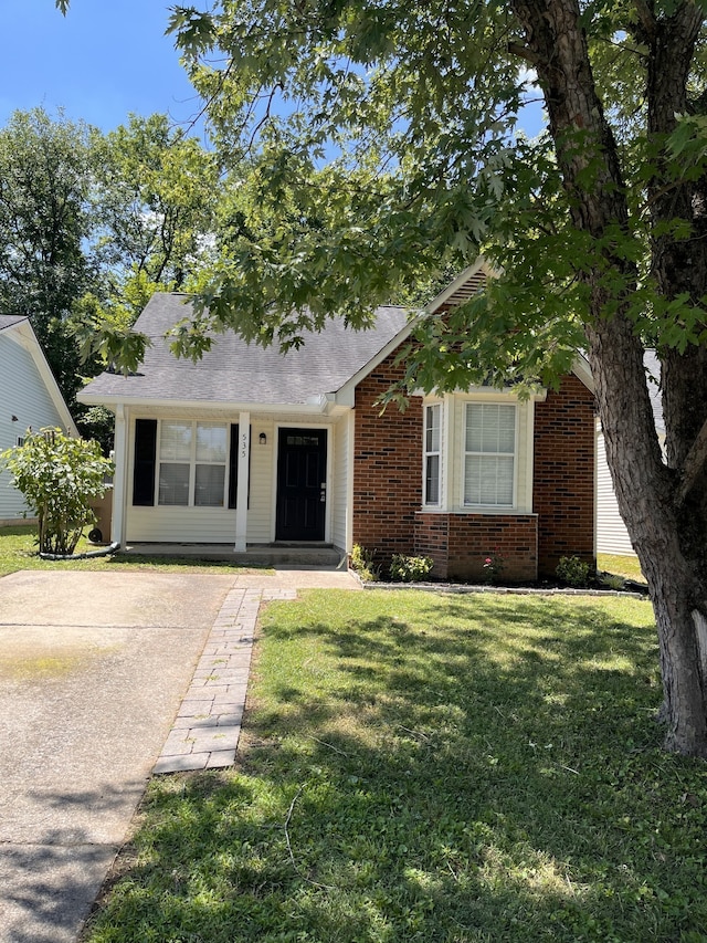 view of front of home with a front yard