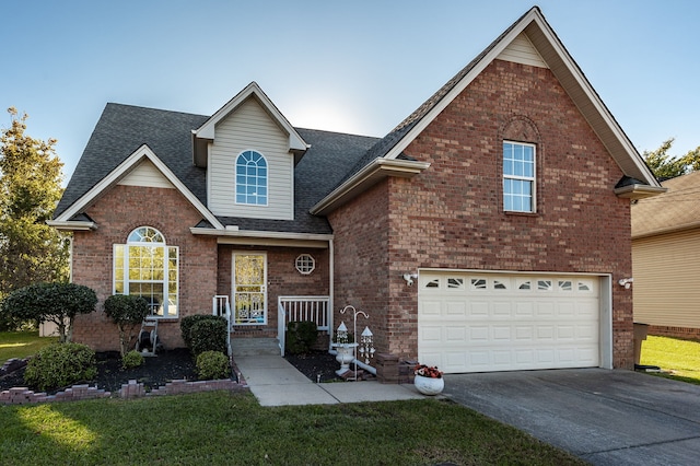 view of front property with a garage and a front lawn