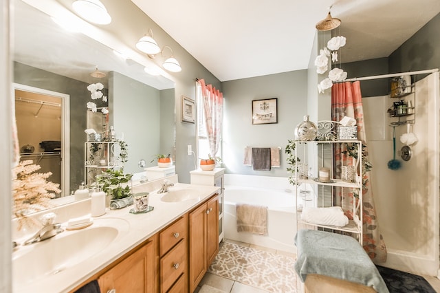 bathroom with vanity, independent shower and bath, and tile patterned flooring