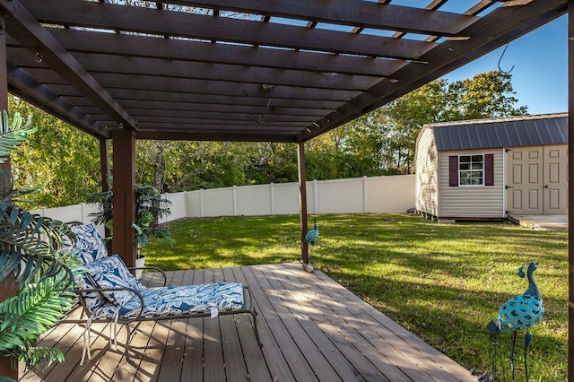 deck featuring a storage shed, a yard, and a pergola