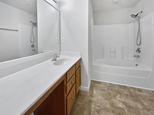 bathroom featuring vanity and tub / shower combination