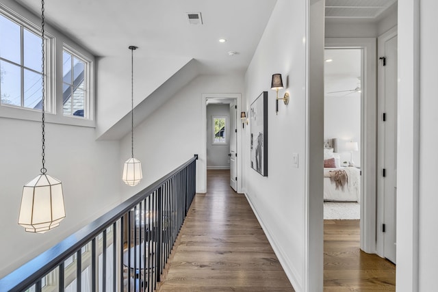 corridor featuring dark wood-type flooring